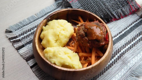 African maize porridge called ugly in bowl. nshima, with meat and sweet potatoes selective focus photo