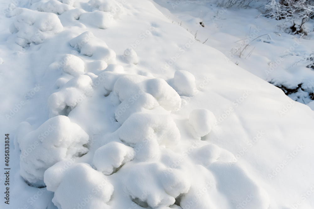 Snow drifts on the river bank-winter view Snow drifts on the river bank-winter view