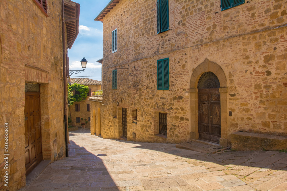 Historic residential buildings in a the centre of the medieval town of Monticchiello near Pienza in Siena Province, Tuscany, Italy
