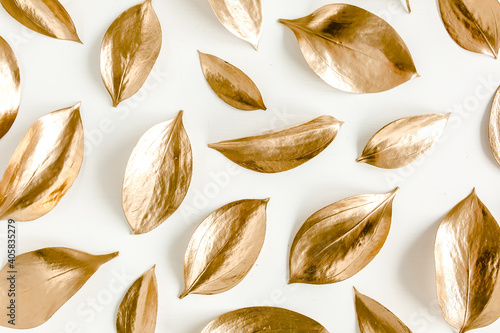 Pattern  texture with gold leaves isolated on white background. flat lay  top view