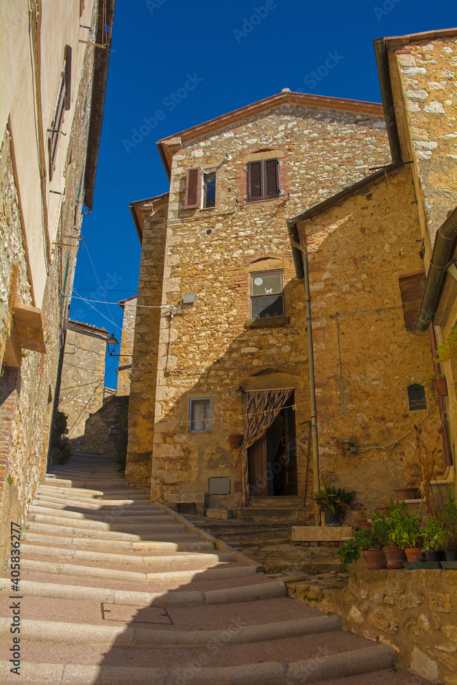 A residential street in the historic medieval village of Semproniano in Grosseto Province, Tuscany, Italy
