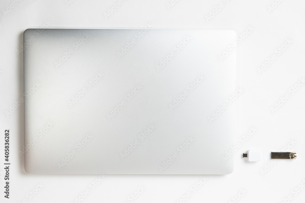 close up. laptop and flash card on a white background . close up. laptop and flash card on a white background .