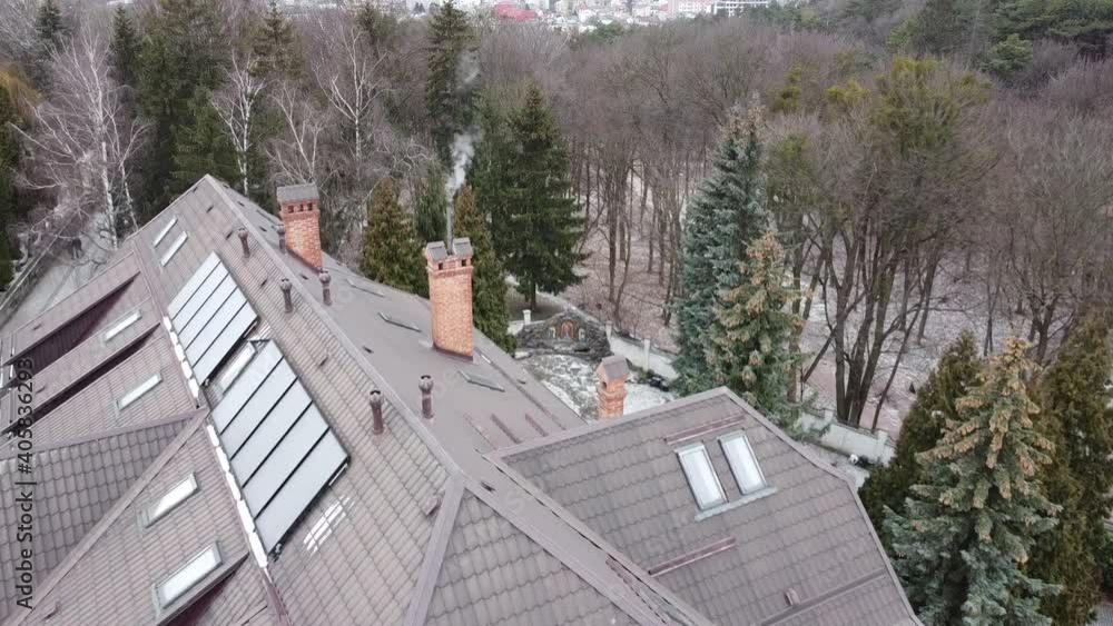 Aerial view of a drone flying over the building.