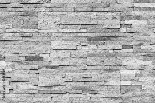Natural facade stone decoration quartzite background texture. modern granite stone wall