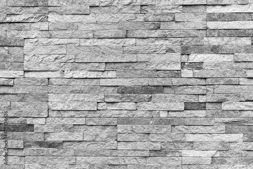 Natural facade stone decoration quartzite background texture. modern granite stone wall