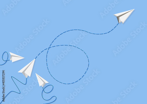 Three paper plane flying in the blue background following the leader one photo