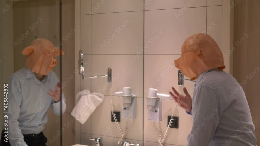 Surprised man in pig mask in 4k slow motion 60fps Surprised man in pig mask in 4k slow motion 60fps