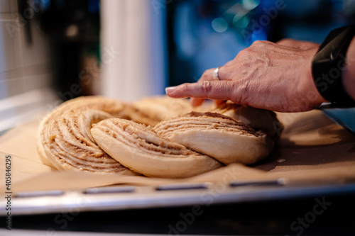 close up of hand prepairing cake dough