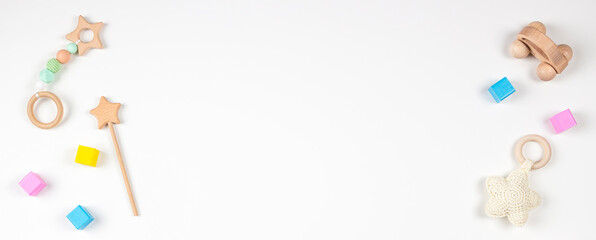 Baby kids toys frame on white background. Top view. Flat lay. Copy space for text