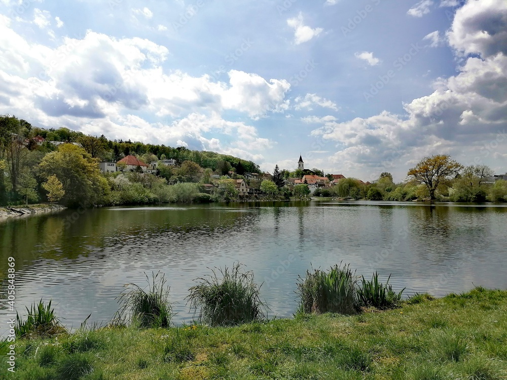 Pond with village
