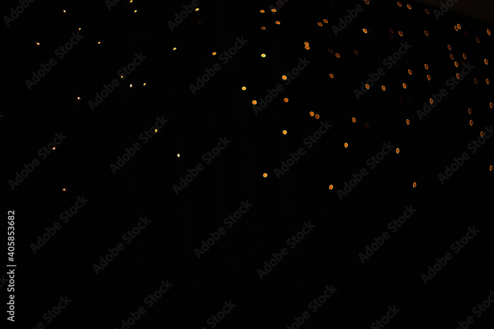 Beautiful golden bokeh on a black background Beautiful golden bokeh on a black background