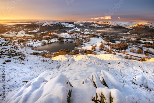 Wallpaper Mural View from Loughrigg Fell on a Winter morning with golden light bathing the snow covered landscape. Lake District, UK. Torontodigital.ca