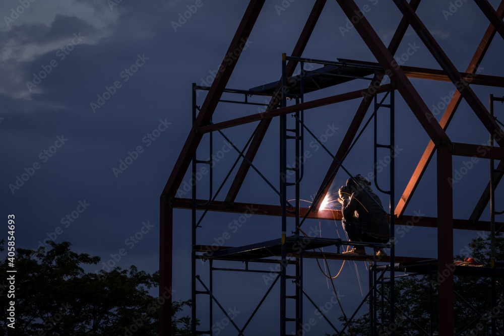 Welder working in work site.