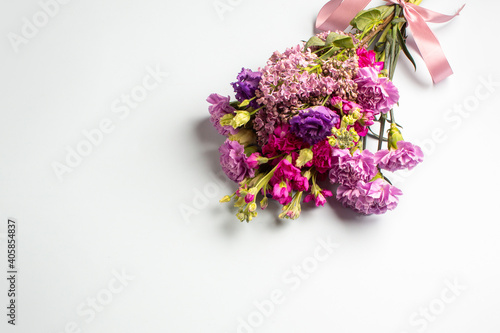 Bouquet from various flowers on white background