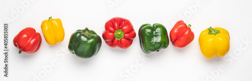 Foto Line of colorful bell peppers on white background. Banner size