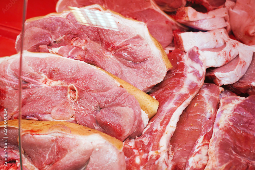 Assortment Of Fresh Pork Meat In The Butcher Shop. Pieces of meat are on display