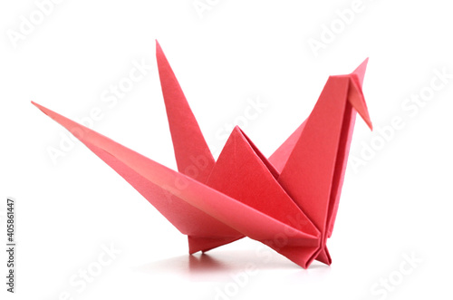 red paper crane origami bird on white