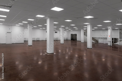 Empty light commercial space. Premises for rent. An empty room with large white walls.