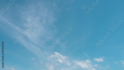 Abstract blue sky cloud background screen. 4k timelapse of skycaps in a sunny day. white cumulus fluffy clouds moving on clear weather in the summer season. b-roll footage panoramic view nature. photo