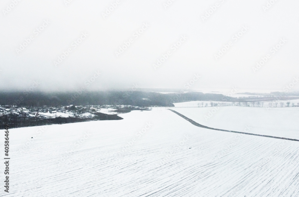 Top view of winter snow agro field