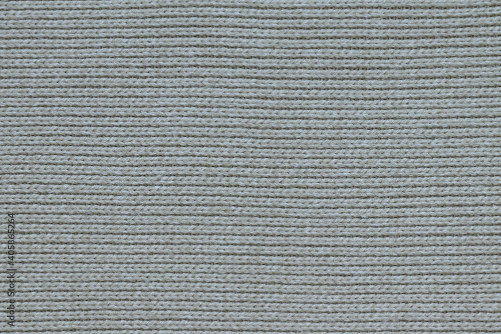 The texture of a light knitted sweater fabric.
The texture of a light knitted sweater fabric.