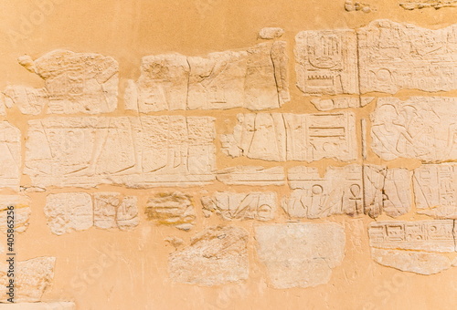 Egyptian hieroglyphs carved in stone. The Karnak Temple Complex, a vast mix of decayed temples, chapels, pylons, and other buildings in Luxor, Egypt