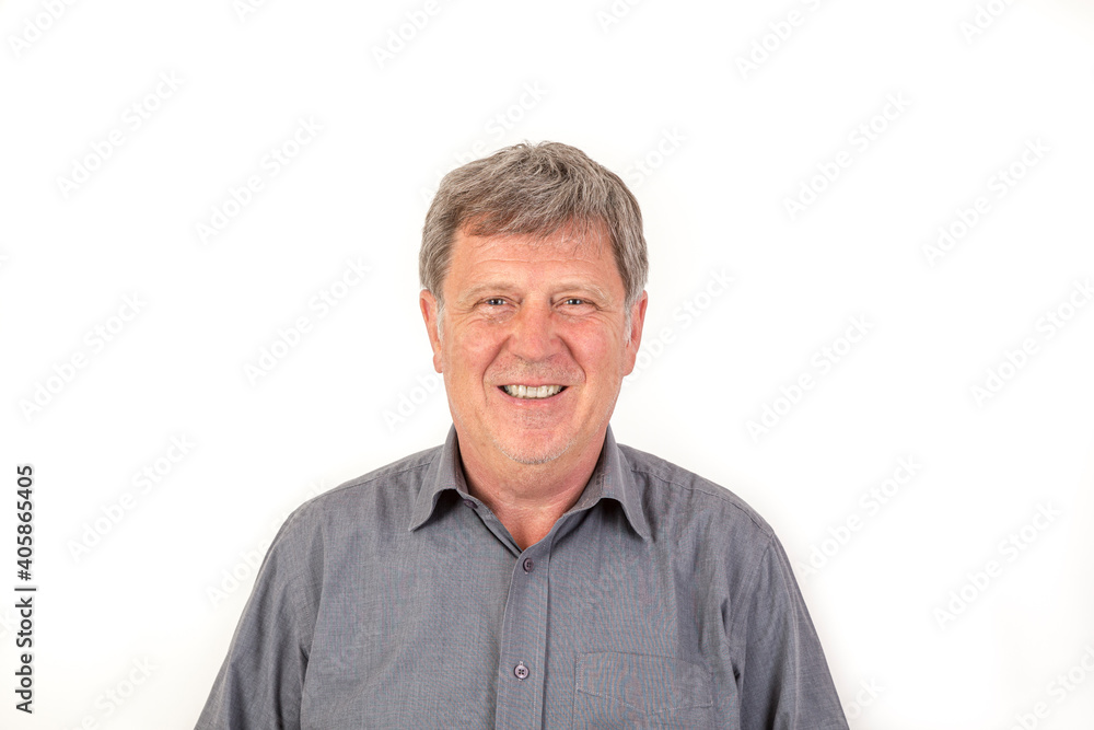 smiling mature man with grey polo shirt smiling mature man with grey polo shirt