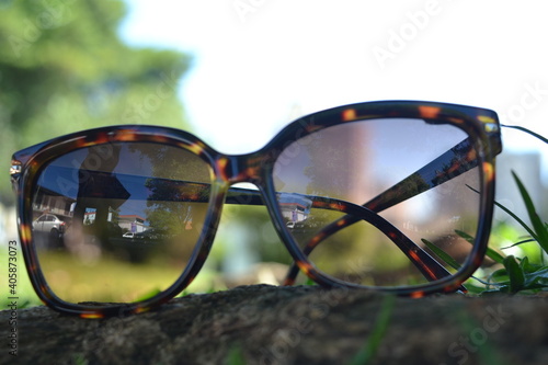 sunglasses on the grass © pedro