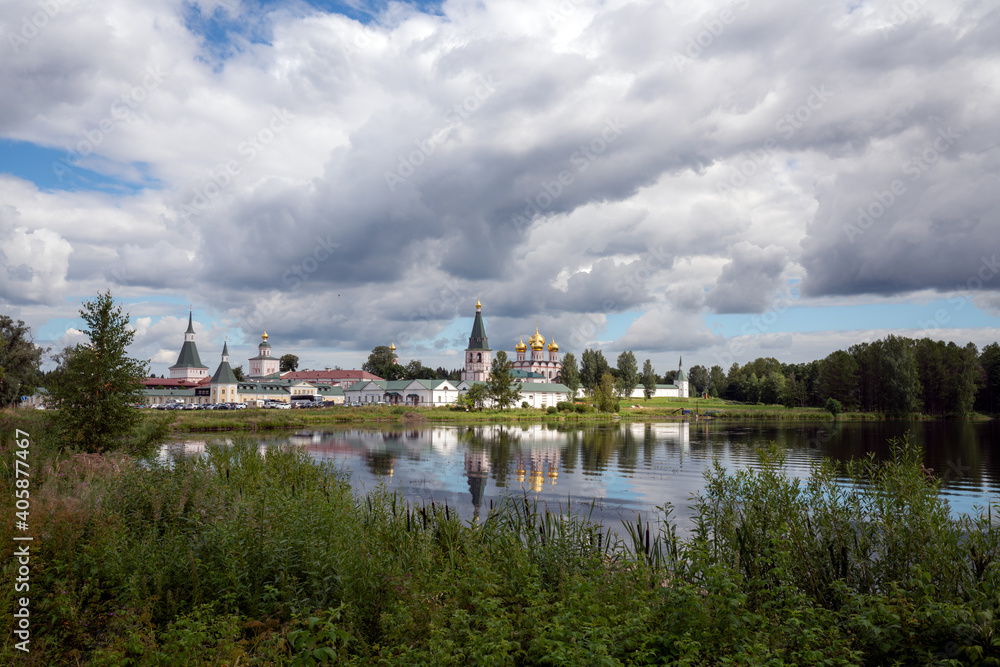 Lake Valdayskoye in the early summer morning and view of the Valdai Iversky Monastery. Valdaysky District of Novgorod Oblast, Russia. August 2020. Lake Valdayskoye in the early summer morning and view of the Valdai Iversky Monastery. Valdaysky District of Novgorod Oblast, Russia. August 2020.