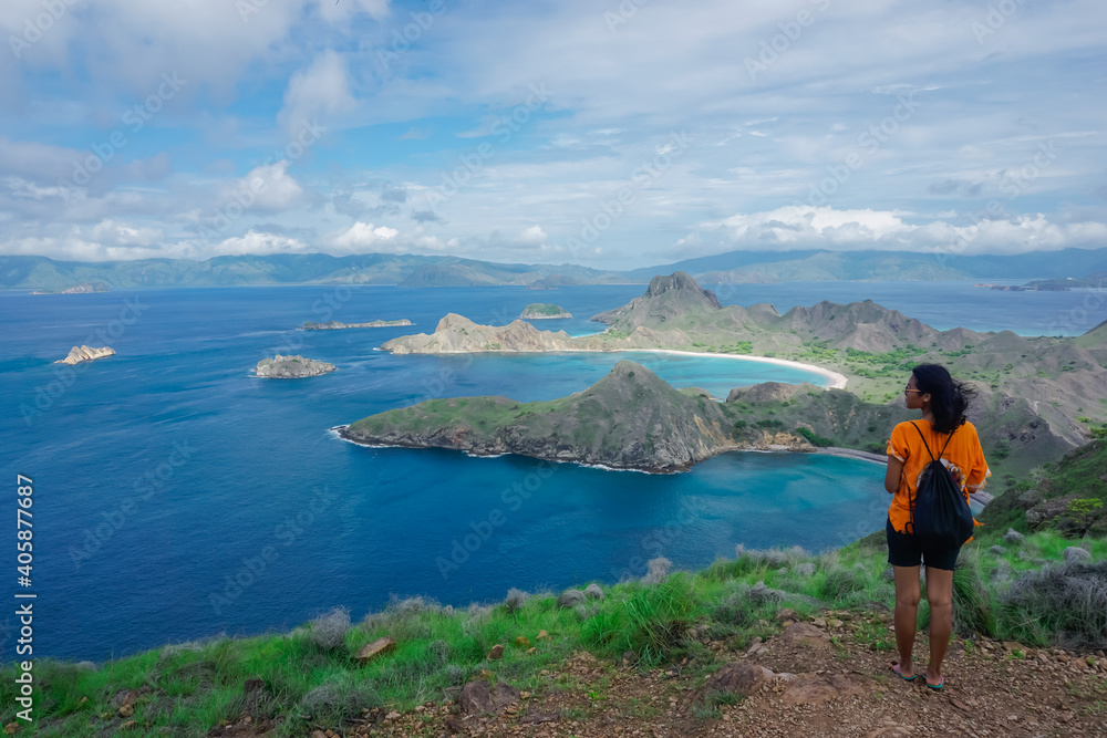 Indonesian girl on Padar island in the waters of the Komodo Islands Indonesian girl on Padar island in the waters of the Komodo Islands