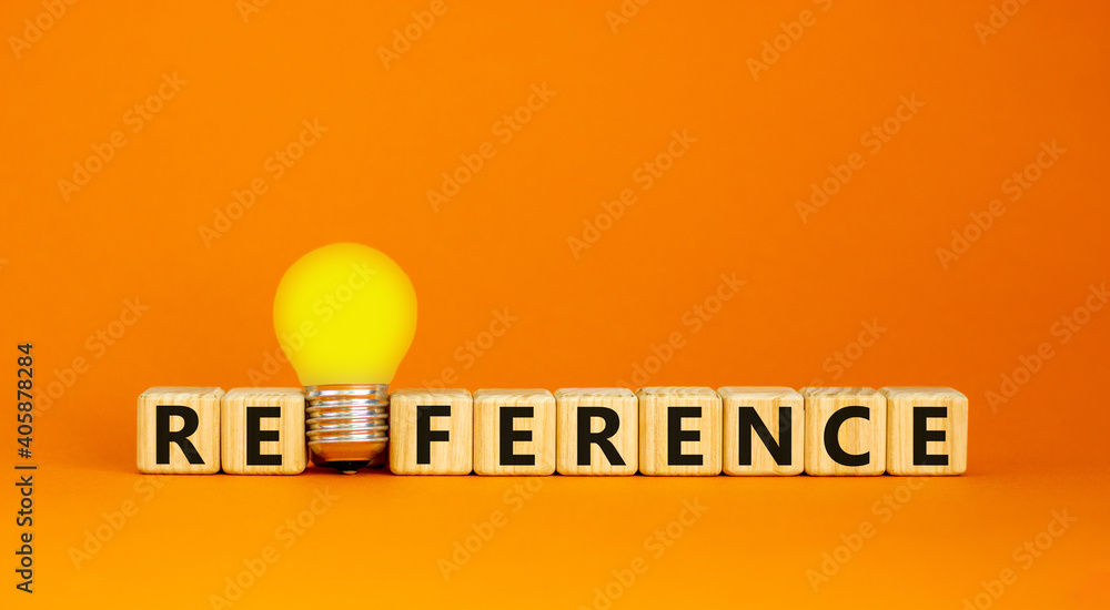 Reference symbol. Wooden cubes with the word 'reference'. Yellow light bulb. Beautiful orange background. Business and reference concept. Copy space. - obrazy, fototapety, plakaty 
