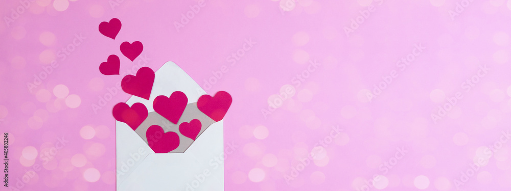 Valentine's day love wedding greeting card template - White envelope and hearts isolated on pink background texture top view, flat lay