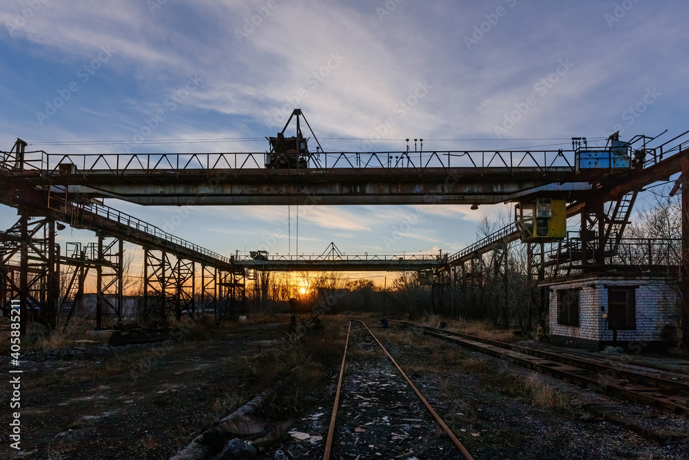Old rusty overhead crane at abandoned industrial area