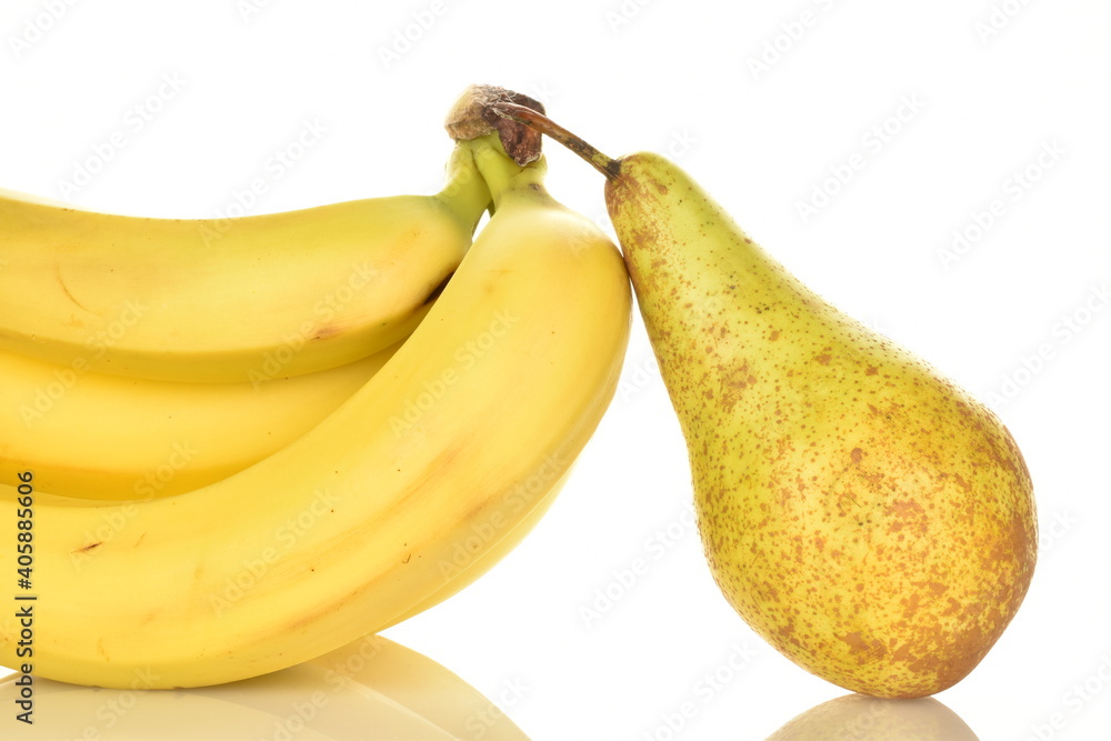 Several ripe yellow bananas and one sweet pear, close-up, isolated on white. Several ripe yellow bananas and one sweet pear, close-up, isolated on white.