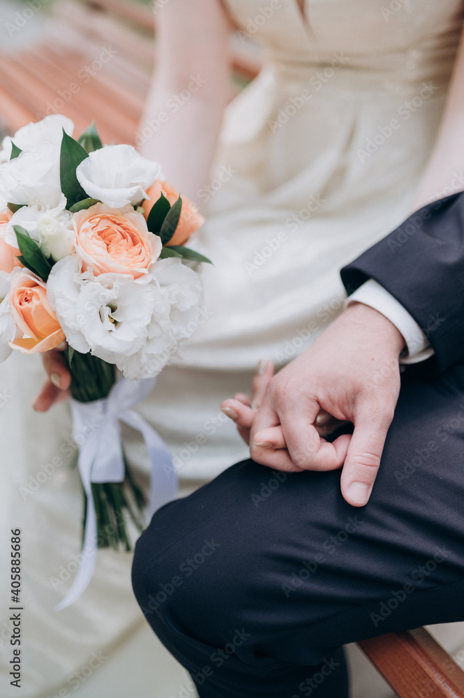 happy bride and groom holding hands happy bride and groom holding hands