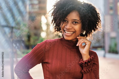 African American woman standing outdoors. © alvaro