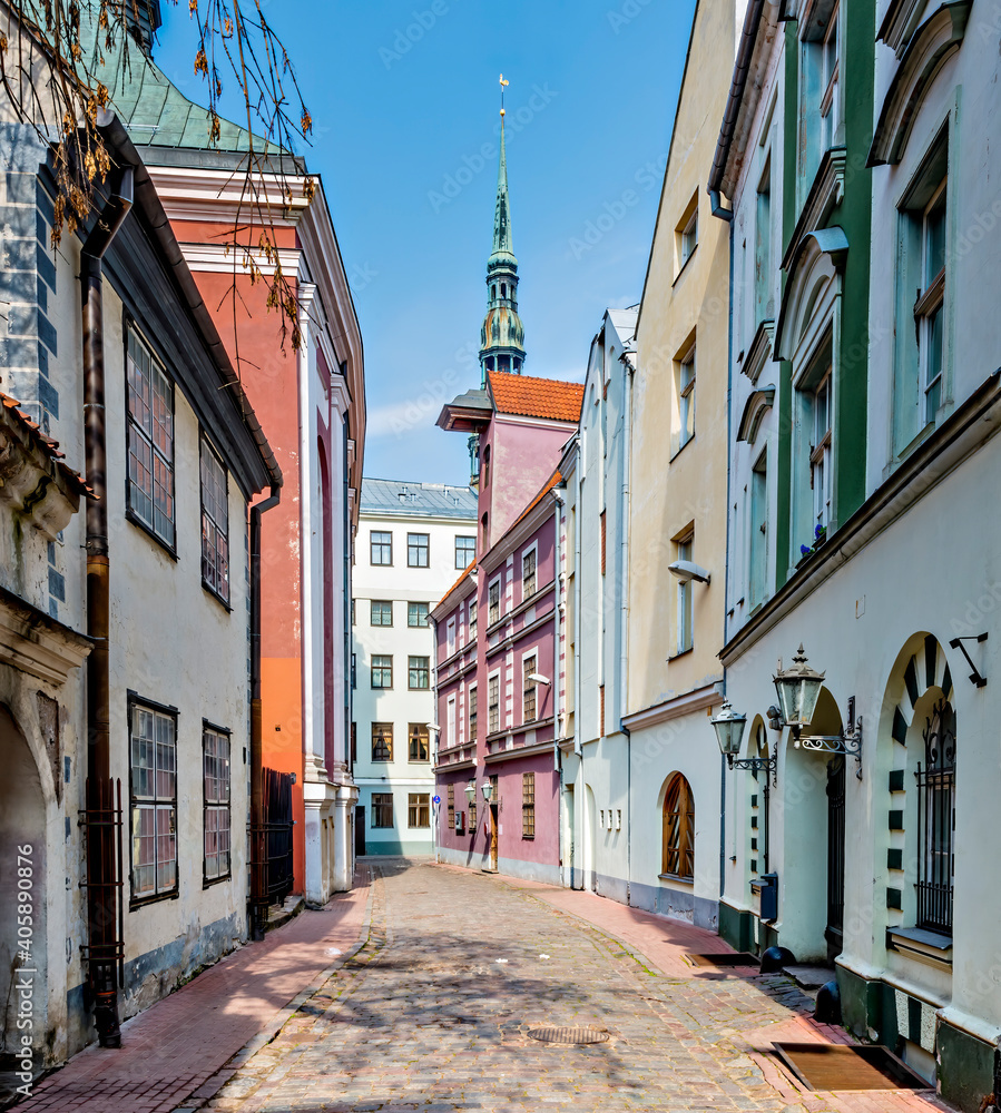 Morning in medieval street of Riga -  the capital of Latvia and famous tourist city in Baltic region of Europe