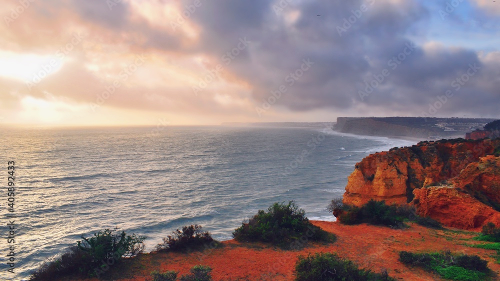 view of Ponta da Piedade, a spectacular rocky promontory along the coast of the city of Lagos in the Portuguese Algarve region. They are one of Portugal's most popular tourist attractions