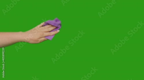 Woman's hand with a rag, wipes the dirt, chromakey