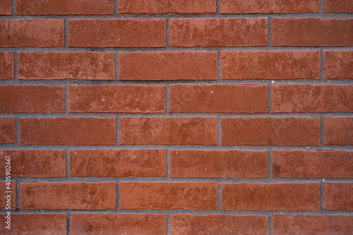 Brick wall. Texture of red brick with gray filling