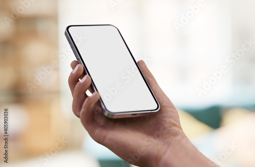 Man hand holding the black smartphone with blank screen and modern frameless 3d illustration, blurred bokeh background