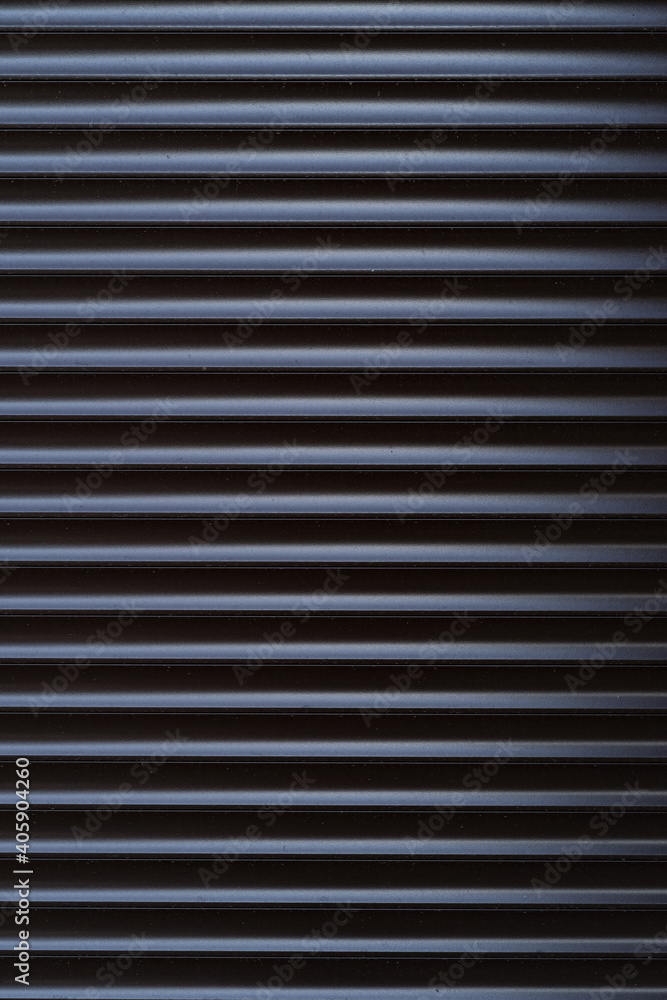 Black iron tin fence lined background. Metal texture Black iron tin fence lined background. Metal texture