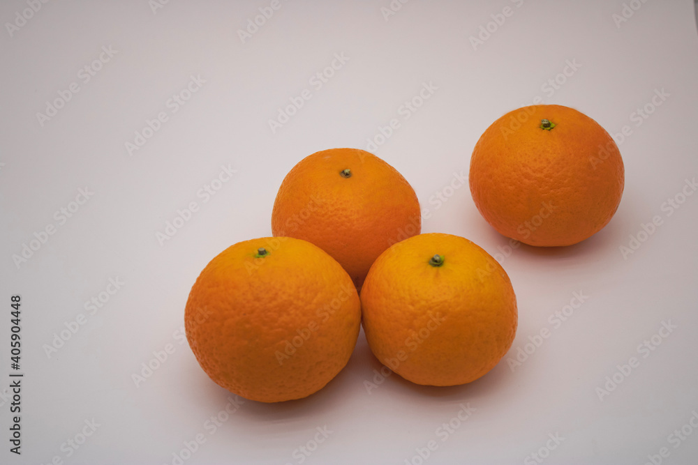 Isolated oranges. A group of fresh orange fruits on a white background. Isolated oranges. A group of fresh orange fruits on a white background.