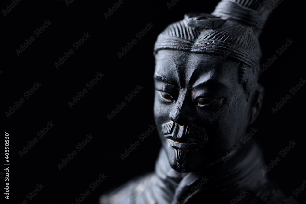 Chinese Warrior isolated on black background. Close up. 