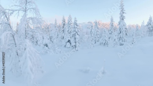 Wallpaper Mural View of snow-covered trees and a skier in a slope at a swedish ski resort at sunset and blu sky after a heavy snow dump Torontodigital.ca