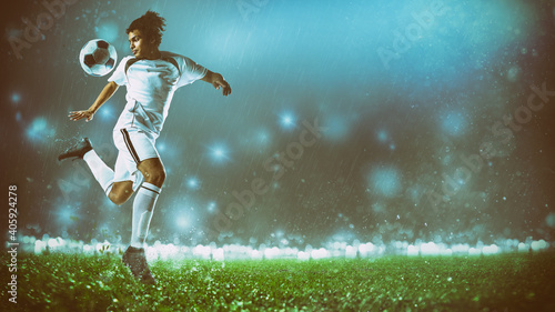 Fotografie Soccer action scene with a footballer in white uniform performing a heel ball st