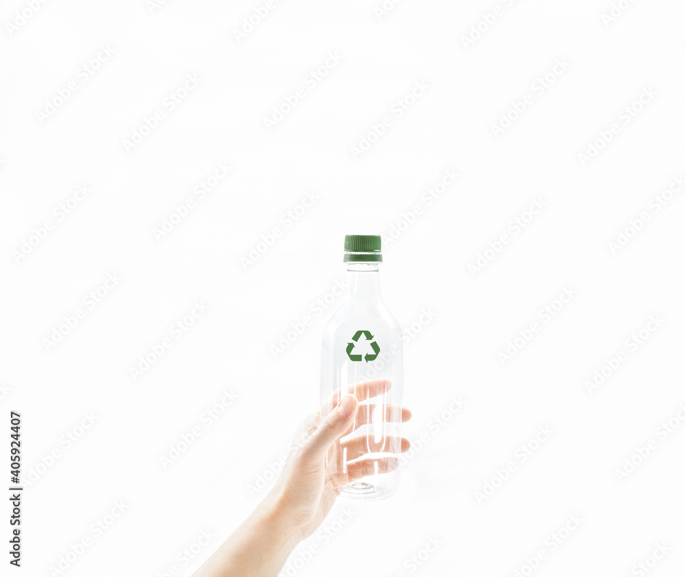 Person S Hand Hold An Empty Transparent Water Bottle With Green Recycle Symbol On White Background Concept Of Care Responsible Recycling And Save The Environment And World From Global Warming Stock Photo