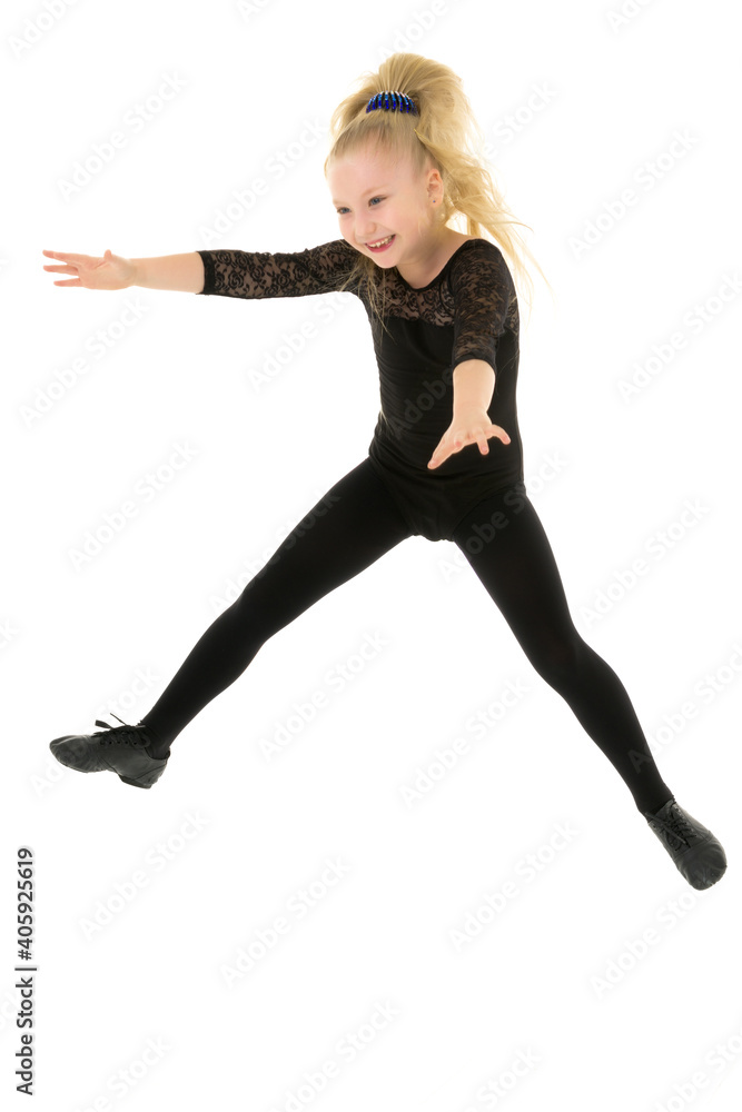 Obraz premium Girl gymnast jumping.The concept of a good mood, summer vacation