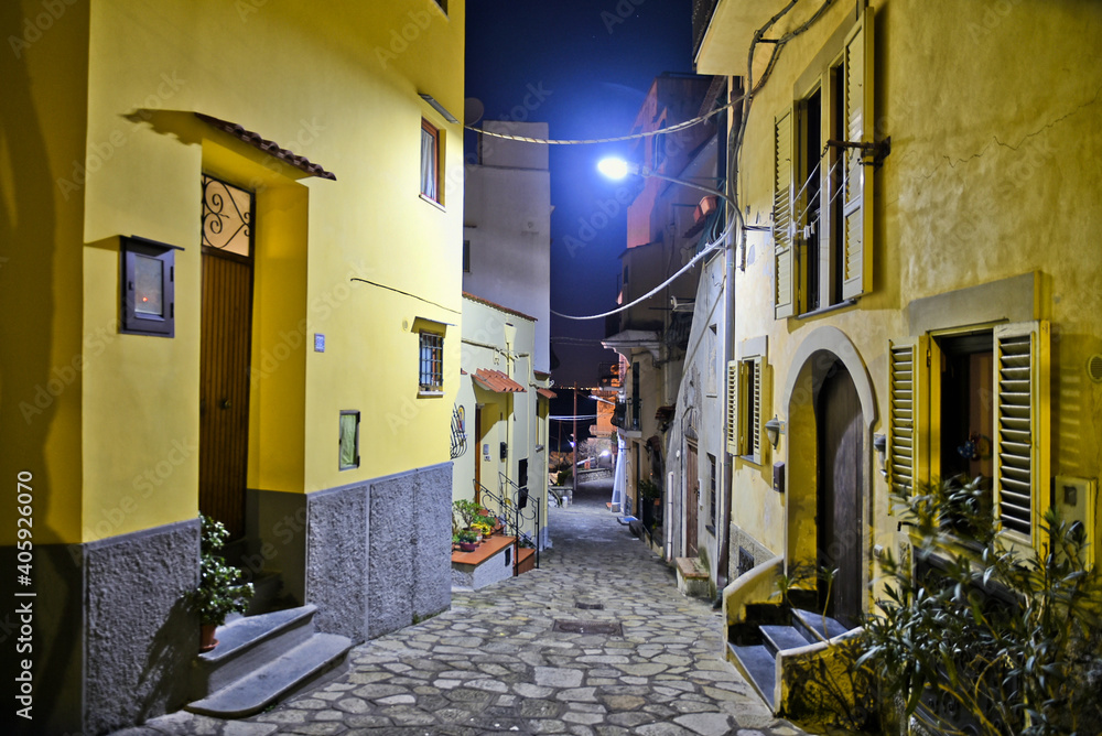 A narrow street at night in the town of Massa Lubrense in the province of Naples, Italy.