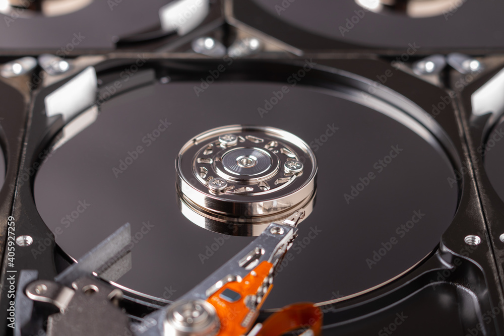 close up of an open hard disk drive close up of an open hard disk drive
